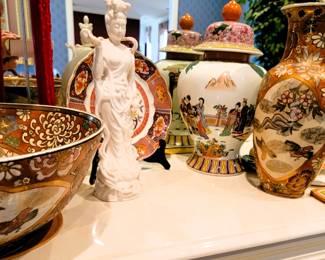 Oriental style decor:  Urn, ginger jar, large bowl, carving and plate