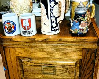 Oak 2-drawer file cabinet.  Beer Stein collection