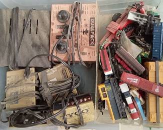 Bin of vintage train items.