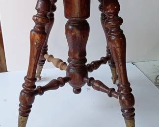 brass claw with glass marble stool