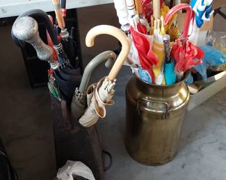 Old coal shuttle and creamer. Lots of umbrellas🌂 in case it rains.