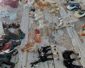 Porcelain and glass horses. Check out the black and white pony with the most unusual markings.  Tina's pick.