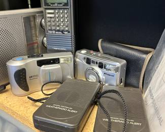 Old electronics, including Hewlett Packard and Polaroid cameras