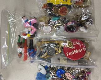 Pins, buttons, small toys, jewelry