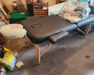 You need this! A portable massage table with heated pad. Ahhhh! Massage stones and heater also available
