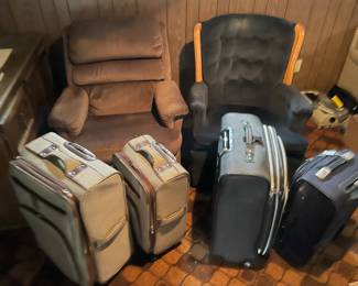 Recliners and luggage.