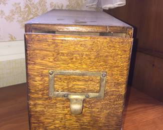 An oak file drawer can stow lots of goodies out of sight. 