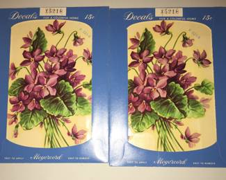 Violet decals are applied with water. Two sets of two decals are available. 