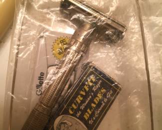 A razor with extra blades in original box with fun graphic. 