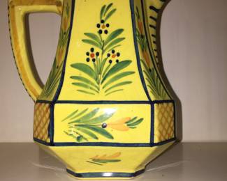 Simple designs dot this cheery pitcher. 