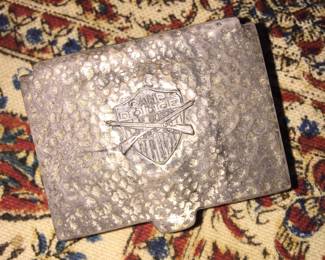 A Camp Dodge souvenir that doubles as a stamp box. 