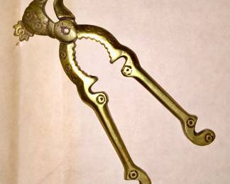 This seemingly parrot inspired nutcracker might have Polly wanting more than a cracker. 