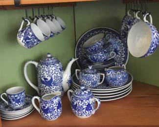 A Japanese china set features birds and filigree. 