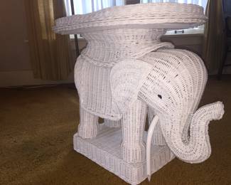 Lighten the elephant’s load by removing the top tray. 