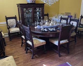Antique table & 12 chairs. Table has 7 leaves. Bought and shipped from England - has companion pieces. Must see this ensemble to appreciate how gorgeous!