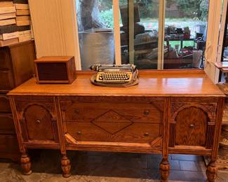 This vintage typewriter would look great in your house!  Oh, and the desk would look good, too!