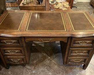 How very elegant!  This ornate desk screams for a prominent place in your house.