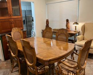 This is a beautiful dining table and chair set, with an elegance all its own.