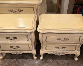 These two nightstands share a style with the dresser.
