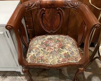 This stuffed wooden chair has a lot of character and style.  