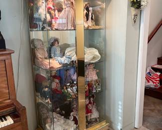 There is a third display or curio cabinet, as can be seen in this image of another corner in the living room.