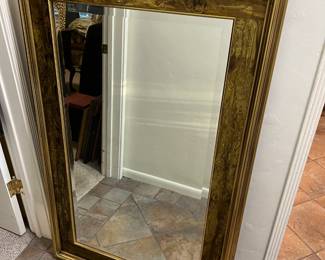 This hanging mirror looks lovely.