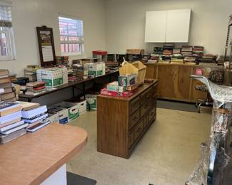 And here is another view of the book collection.  Yes, there is an exercise bike wrapped in cellophane.
