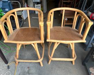 2 vintage rattan swivel chairs 
