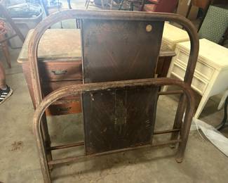 Antique metal bed. No rails. Makes great yard art decor