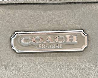 Buttery Soft Coach Purse
Inner lining has some staining as shown. Outside is gorgeous, with just a few tiny marks, as shown. 