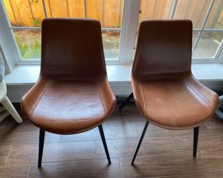 Arhaus Leather Dining Chair  available for pre-sale at $425.00 for the pair.