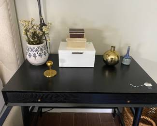 West Elm black desk (mid-century design).  Available for pre-sale at $225.00 see next frame for retail reference (estatesales.net removed my retail reference photo)