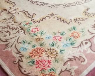 Vibrant colored hook rug, reverse side.