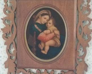 Madonna and child in ornate Victorian frame.