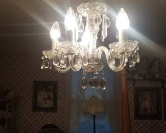 One of several crystal chandeliers for sale. These are the old ones NOT the plastic ones in today's market.