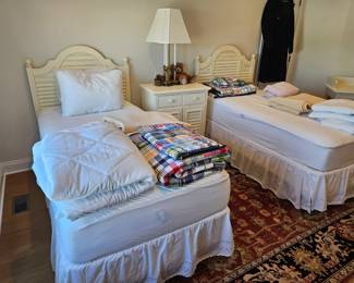 Twin beds like new, mattress covers etc.