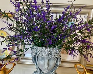 Base with faux flowers