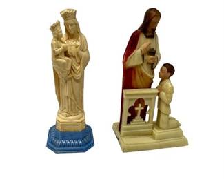Lot 57  
Lot of 2 Celluloid Religious Figures