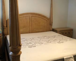 King size poster bed. Has some chew marks. $50