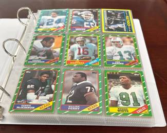  002 350 1986 Topps Football Cards Including Joe Montana, Dan Marino, John Elway, Reggie White, And More