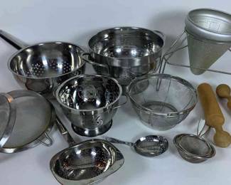 A Variety Of Colander And Sifters