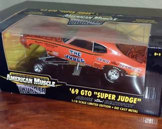 Diecast 1:18 Scale UT Models Porche 911 GT1, American Muscle Thunder 69 GTO Super Judge, And American Muscle Classics 1935 Auburn 851, In Original Boxes
