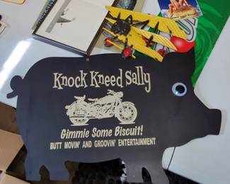 Assorted Signs Including Knock Kneed Sally Gimmie Some Biscuit!, Airplane Wall Hanger, Cat Picture, And Fish Wall Hanger
