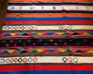 Artisan woven southwest style hand-loomed/dyed fiber art rug.