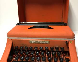 My Tom Thumb "orange" typewriter.  Needs refurbishing and can give you referrals.