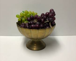 Brass footed bowl with faux grapes.