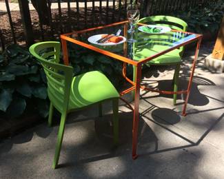 MCM 1960's Iron Garden Table with curled feet, curved supports, professional sand blasted and custom painted "seasonal orange".