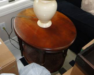 Oval side table with rattan shelf 28x23 $50