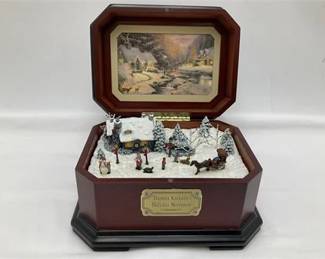 Lot 050   
Thomas Kinkade’s Holiday Merriment Music Box