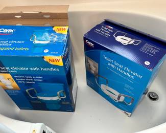 Elevated toilet seats with handles 